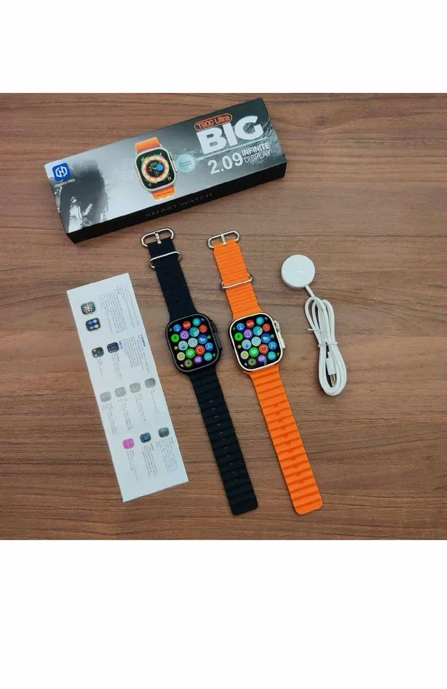 T900 Ultra smart watch in black and orange ocean straps with charger, manual and box